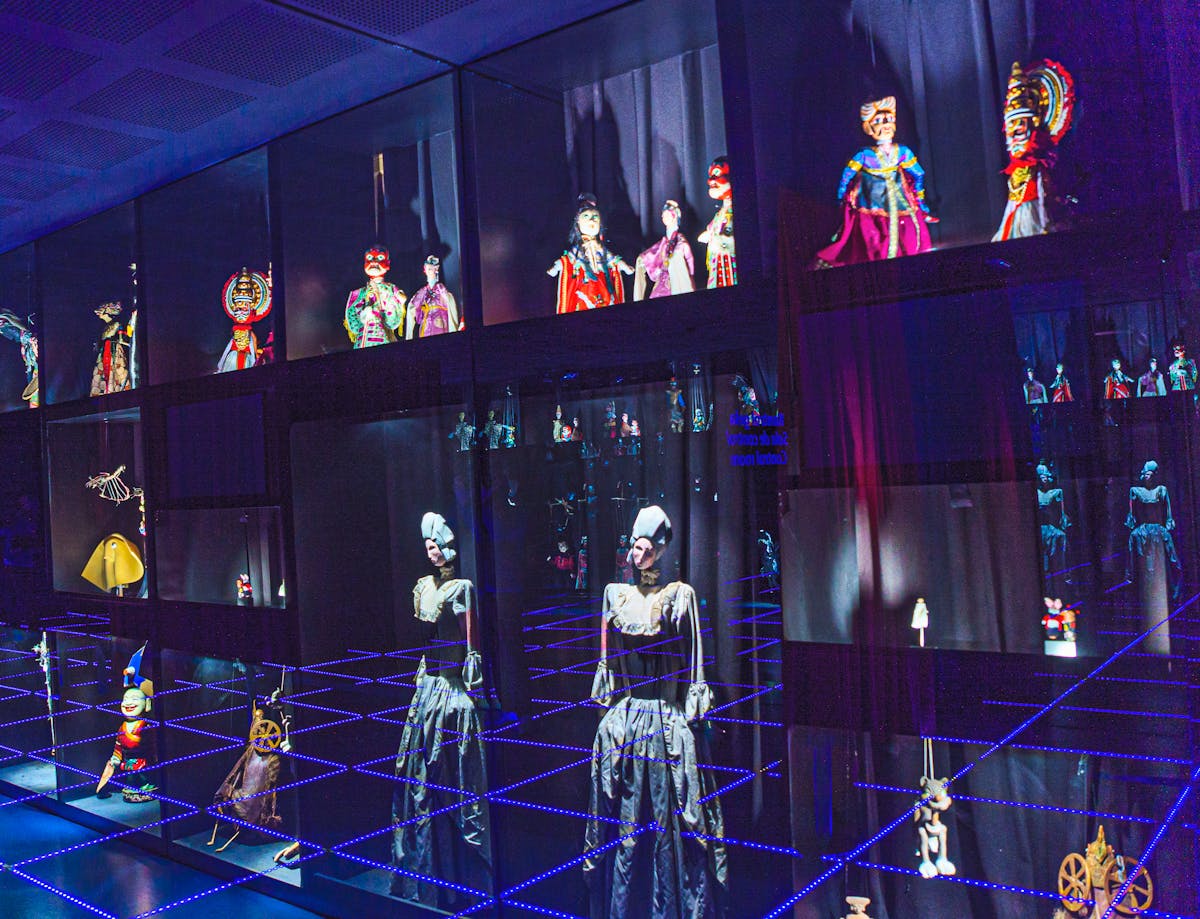 Editorial illustration of a woman holding a crystalized handbag against a glossy night-luxe backdrop.